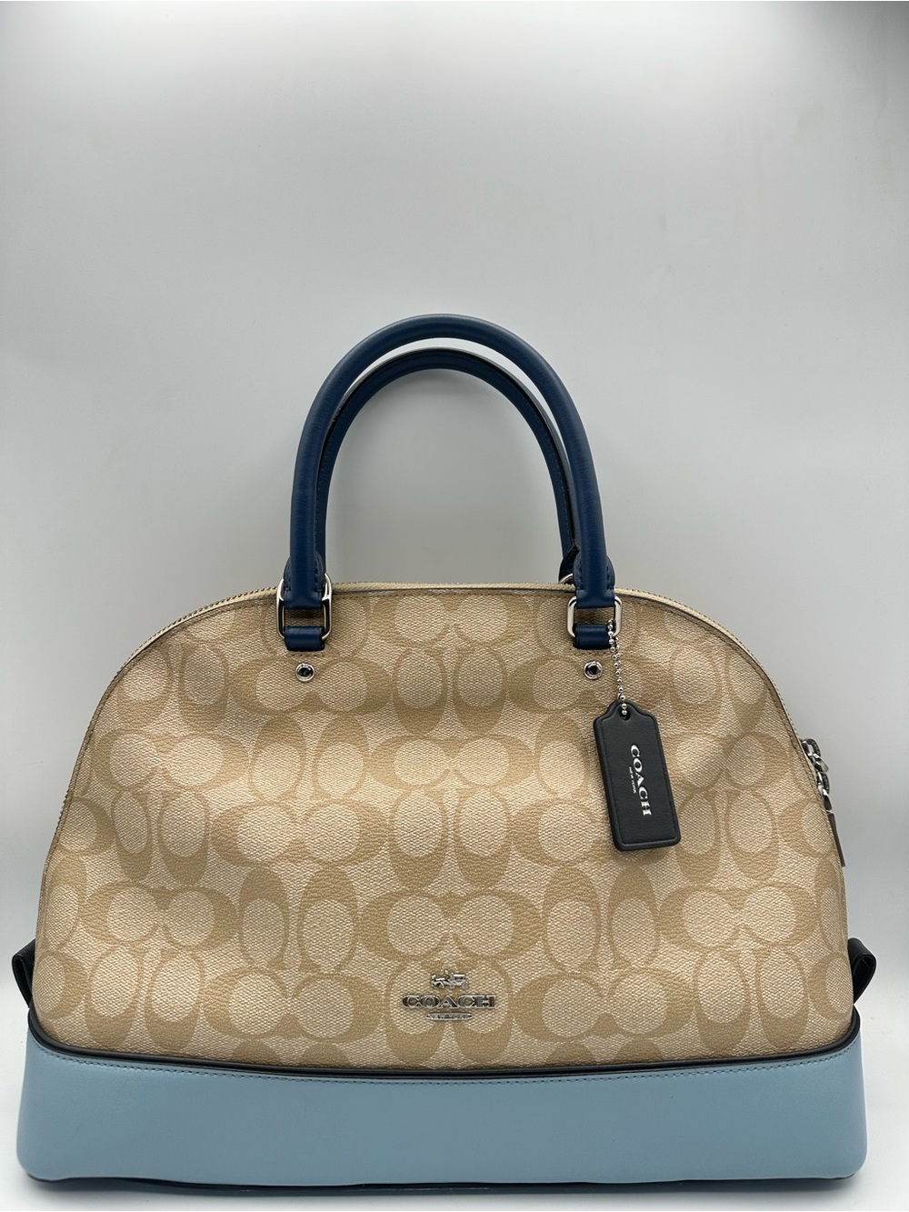 Coach Sierra Satchel in beige signature coated leather.